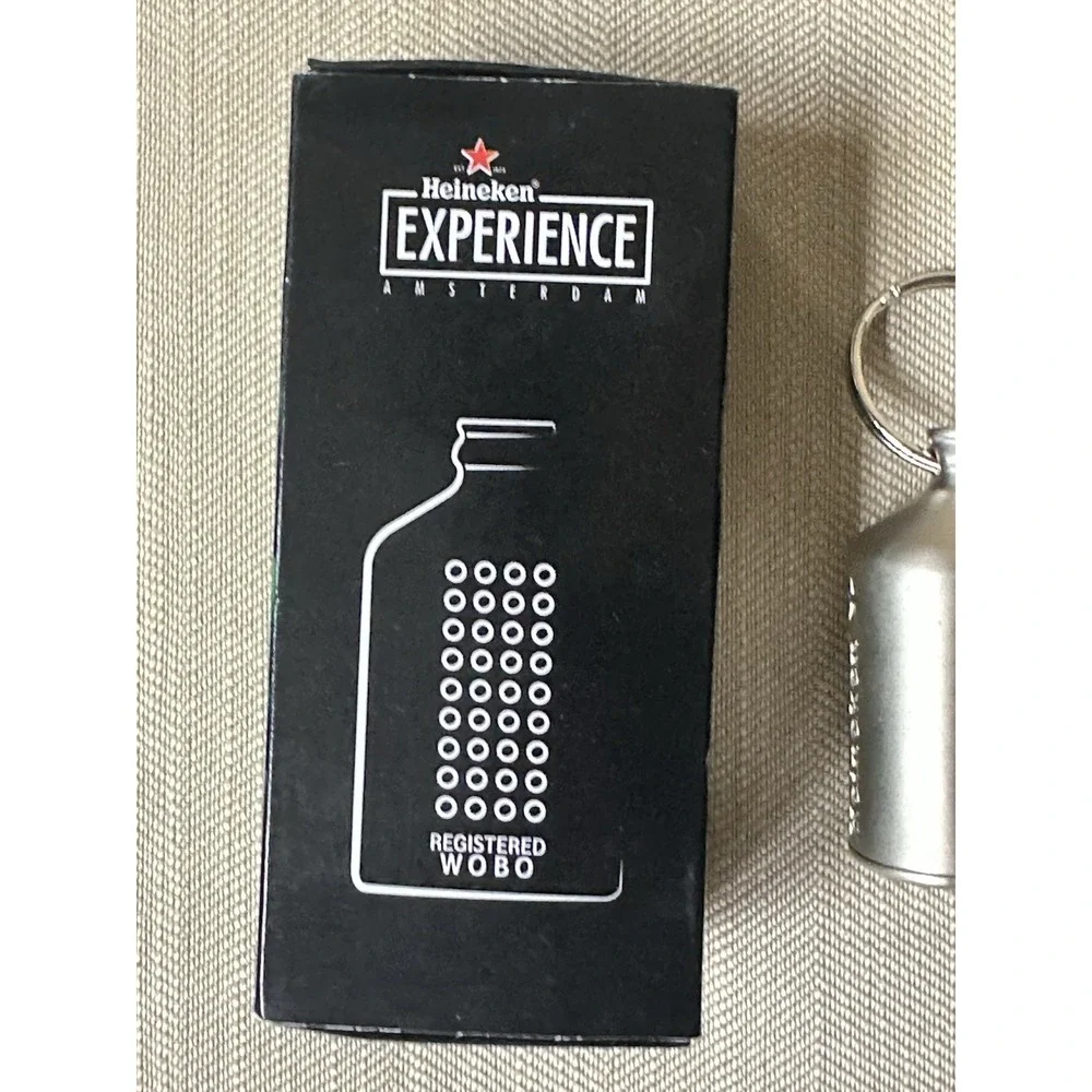 NEW - HEINEKEN EXPERIENCE BEER BOTTLE OPENER KEY CHAIN REGISTERED WOBO AMSTERDAM